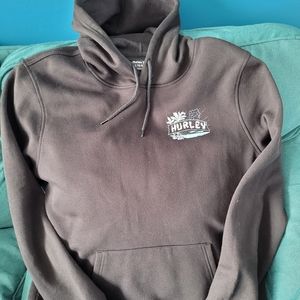 Hurley black hoodie with kangaroo pocket and unique design on back